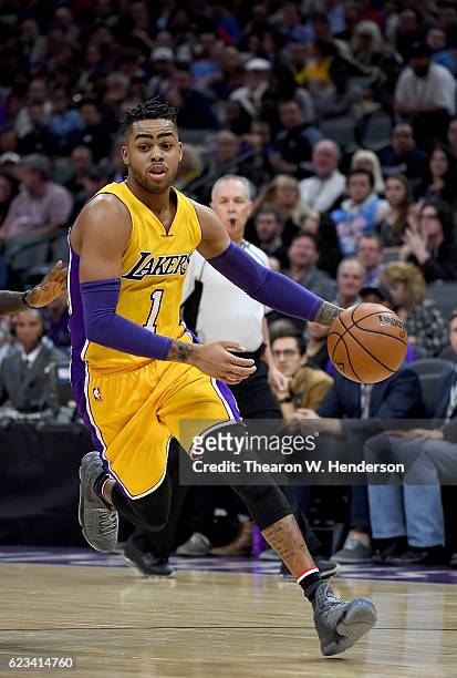 Angelo Russell of the Los Angeles Lakers dribbles the ball against the Sacramento Kings during an NBA basketball game at Golden 1 Center on November...