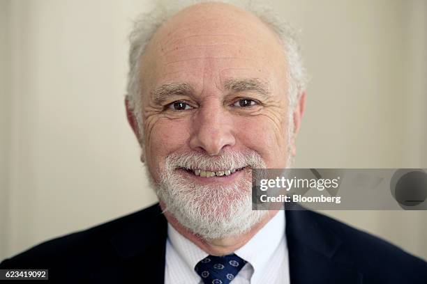 William "Bill" Baer, principal deputy associate attorney general at the U.S. Department of Justice, smiles for a photograph after an interview at the...