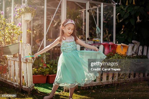 girl ( 5) dancing in field in princess dress - princess stock pictures, royalty-free photos & images