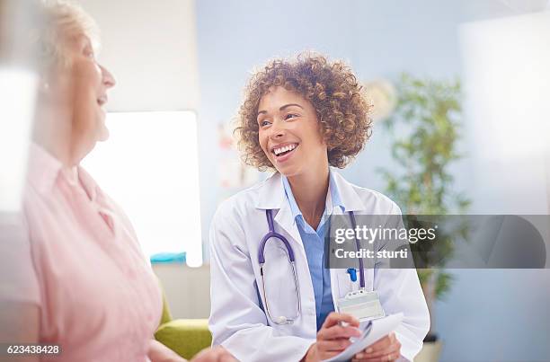 laughter is the best medicine - back lit doctor stock pictures, royalty-free photos & images