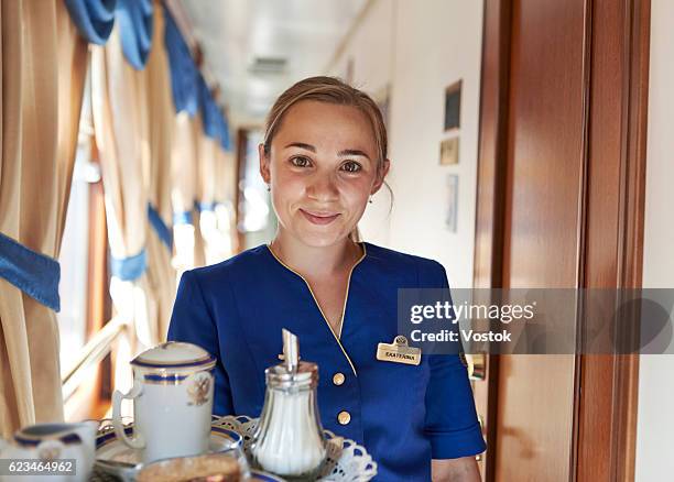 room service at the luxury trans-siberian express train - train guard stock pictures, royalty-free photos & images