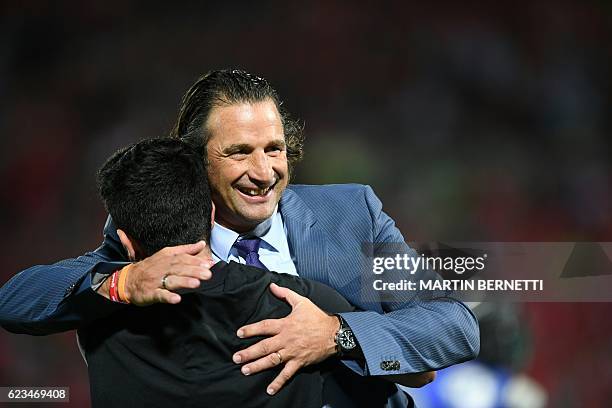 Chile's coach Juan Antonio Pizzi celebrates after defeating Uruguay in a 2018 FIFA World Cup qualifier football match in Santiago, on November 15,...
