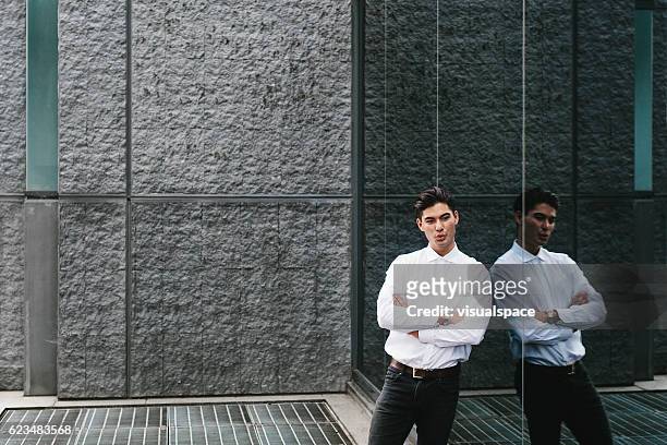 businessman having a break outdoors - mirror reflection stock pictures, royalty-free photos & images