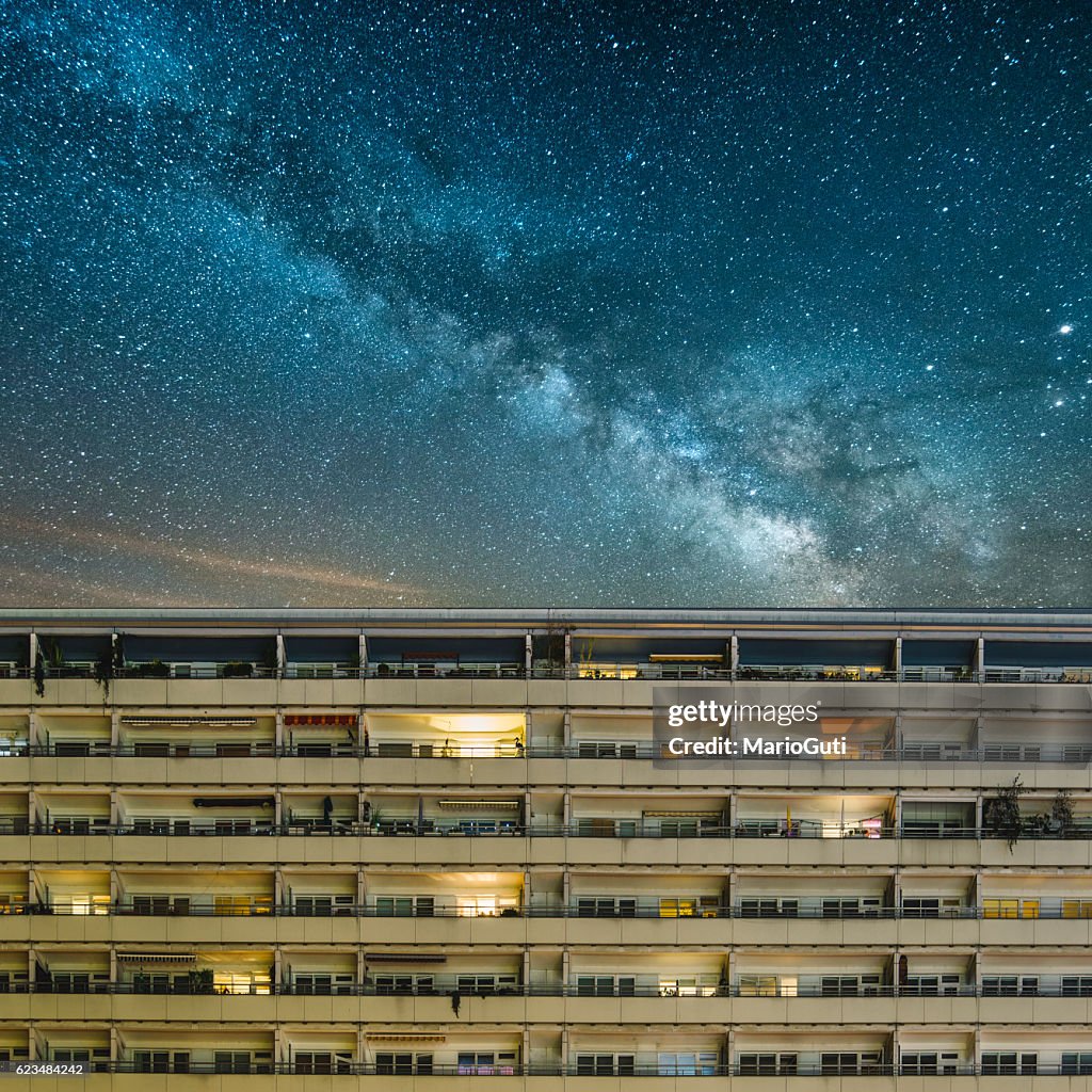 Residential building under a starry sky