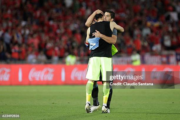 Claudio Bravo of Chile embraces Luis Suarez of Uruguay after a match between Chile and Uruguay as part of FIFA 2018 World Cup Qualifiers at Nacional...