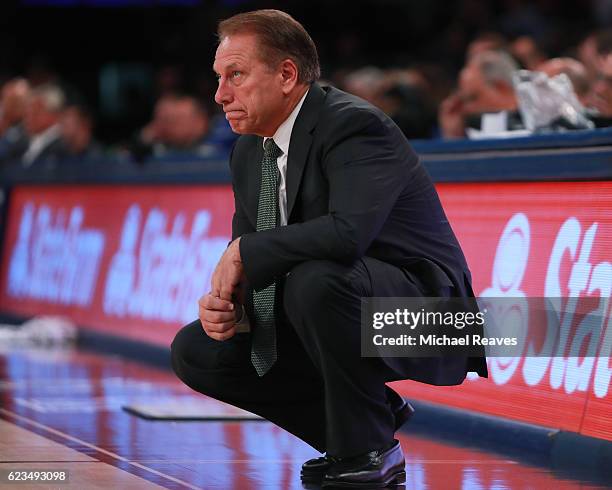 Head coach Tom Izzo of the Michigan State Spartans reacts against the Kentucky Wildcats in the second half during the State Farm Champions Classic at...