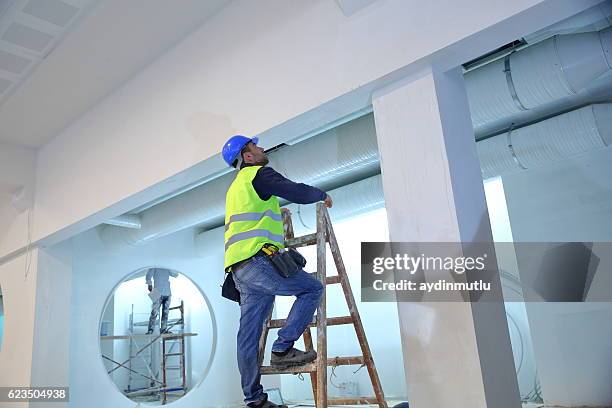 plaster master - air conditioner interior wall stock pictures, royalty-free photos & images