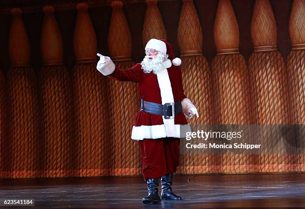 Santa appears on stage during the "Christmas Spectacular Starring The Radio City Rockettes" Opening Night at Radio City Music Hall on November 15,...