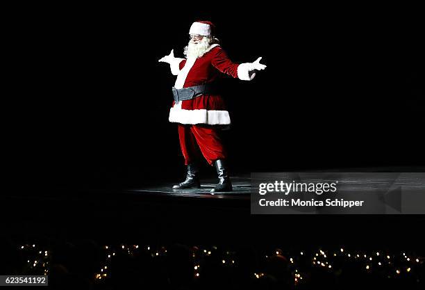 Santa appears on stage during the "Christmas Spectacular Starring The Radio City Rockettes" Opening Night at Radio City Music Hall on November 15,...