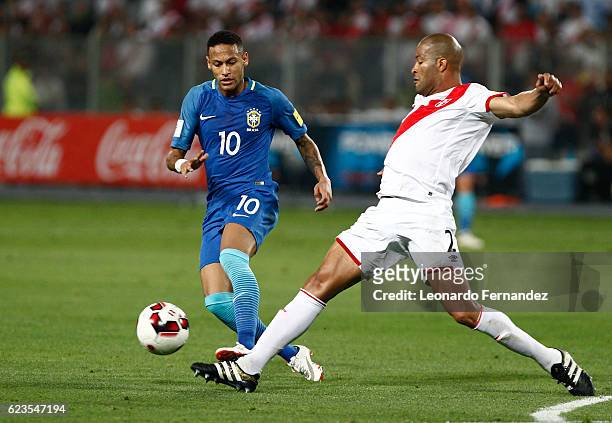 Neymar Jr. Of Brazil struggles for the ball with Alberto Rodriguez of Peru during a match between Peru and Brazil as part of FIFA 2018 World Cup...