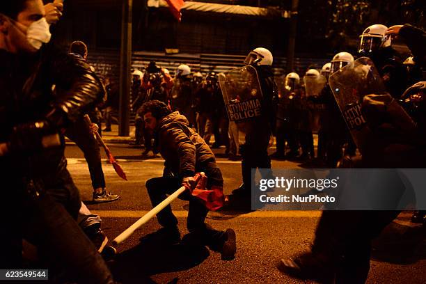 Clashes erupt between protesters and police during a demonstration in central Athens against US president Obama visit in Greece on November 15, 2016.