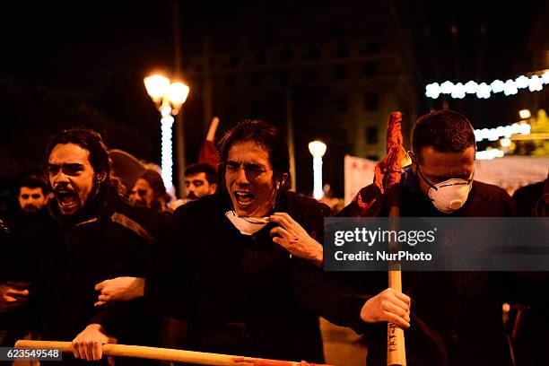 Clashes erupt between protesters and police during a demonstration in central Athens against US president Obama visit in Greece on November 15, 2016.