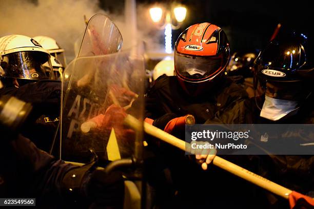 Clashes erupt between protesters and police during a demonstration in central Athens against US president Obama visit in Greece on November 15, 2016.