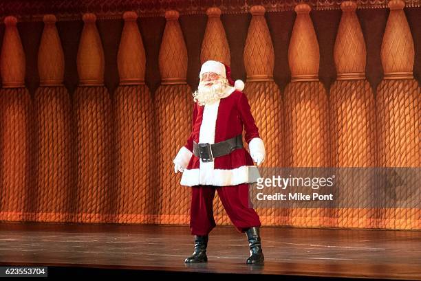 Santa Claus performs during the 2016 Radio City Christmas Spectacular Opening Night at Radio City Music Hall on November 15, 2016 in New York City.