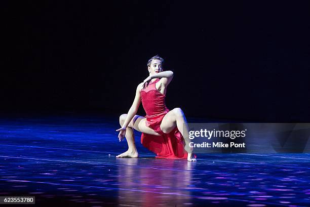 Garden of Dreams Talent Show performer Stephanie Consiglio performs on stage during the 'Christmas Spectacular Starring The Radio City Rockettes'...