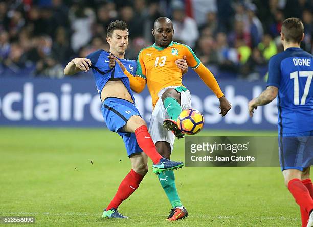 Laurent Koscielny of France and Giovanni Sio of Ivory Coast in action during the international friendly match between France and Ivory Coast at Stade...