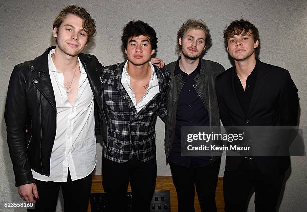 Recording artists Luke Hemmings, Calum Hood, Michael Clifford, and Ashton Irwin of music group 5 Seconds of Summer attend Hollywood Gala celebrating...