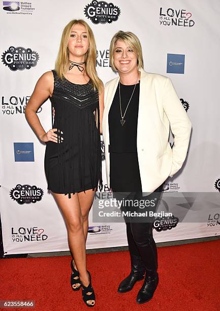 Actress Lexi DiBenedetto and Director K. Rocco Shields arrive at the Los Angeles Premiere of LOVE IS ALL YOU NEED? at ArcLight Hollywood on November...