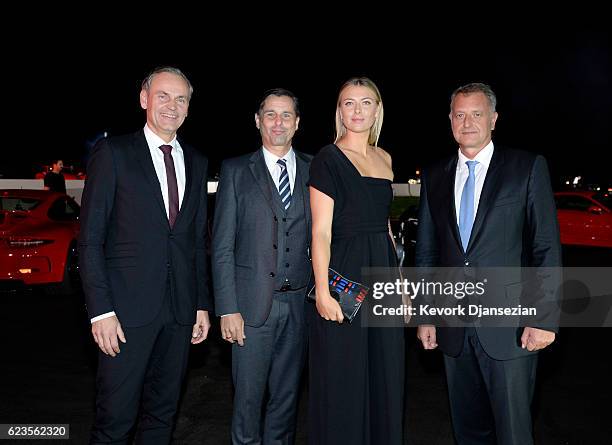 From left to right, Oliver Blume, Klaus Zellmer, Maria Sharapova and Detlev von Platen attend the opening of the Porsche Experience Center Los...