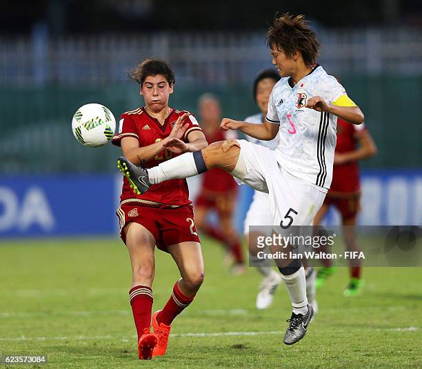 Lucia Garcia Cordoba of Spain tries to tackle Ruka Norimatsu of Japan during the FIFA U-20 Women's World Cup, Group B match between Spain and Japan...