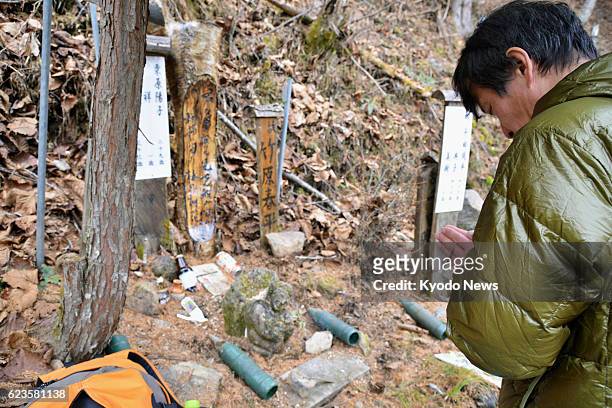 Man prepares on Nov. 14 for the winter closure of Osutaka Ridge, northwest of Tokyo, where 520 crew and passengers died in a 1985 Japan Airlines...