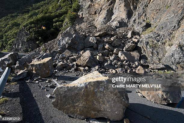 Landslide triggered by the November 14 earthquake covers State Highway 1 south of Kaikoura on November 16, 2016. Rescue efforts after a devastating...