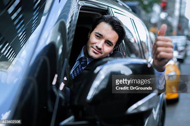 happy driver showing thumb up - social grace stock pictures, royalty-free photos & images
