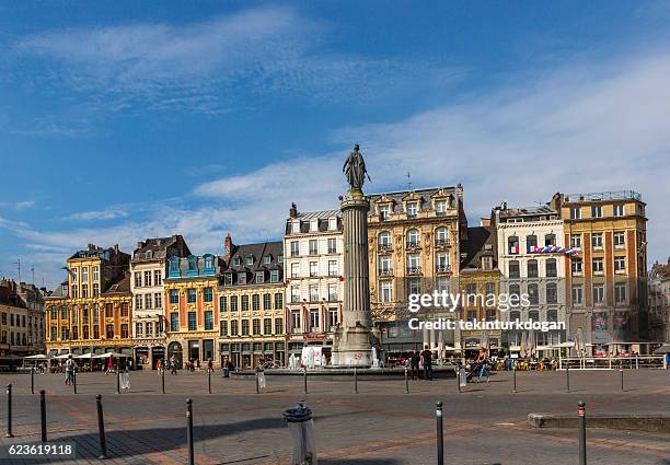 traditional old buildings by downtown street at lille france - lille cafe stock pictures, royalty-free photos & images