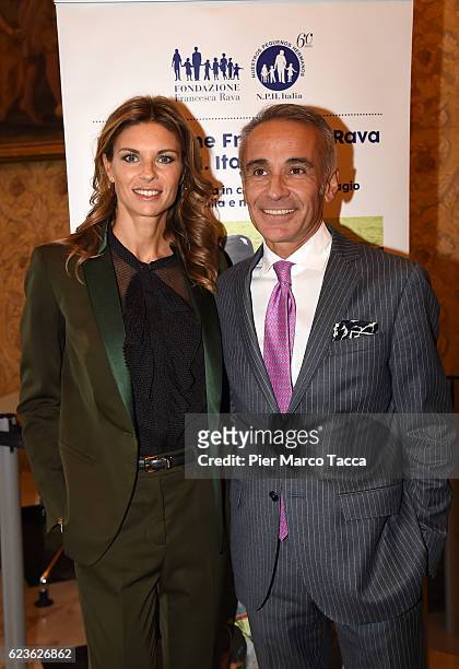 Martina Colombari and Roberto Valente Director of Cosmofarma attend a press conference for 'In Farmacia Per I Bambini' at Palazzo Marino on November...
