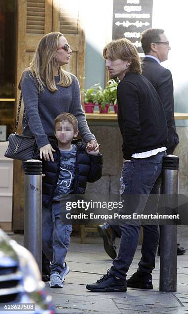 Real Madrid football player Luka Modric, his wife Vanja Bosnic Modric and their son Ivano Modric are seen leaving 'Quintint' restaurant on November...