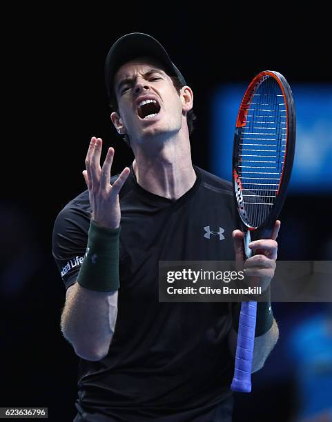 Andy Murray of Great Britain reacts during his mens singles match against Kei Nishikori of Japan on day four of the ATP World Tour Finals at O2 Arena...