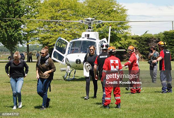 People arrive in Christchurch, New Zealand, on Nov. 16 from Kaikoura, which has been isolated since a powerful earthquake jolted the country, by...