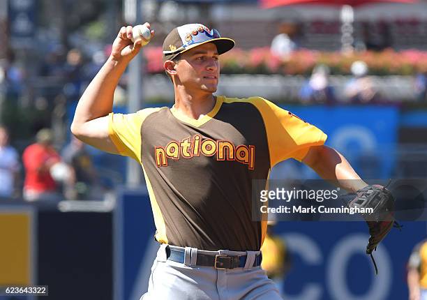 National League All-Star Corey Seager of the Los Angeles Dodgers fields during warm-ups prior to the 87th MLB All-Star Game at PETCO Park on July 12,...