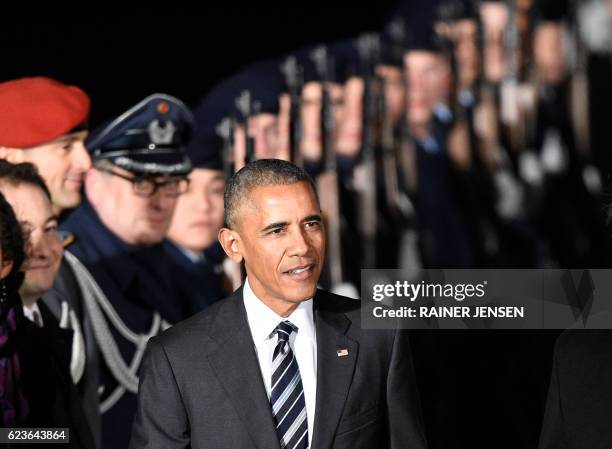 President Barack Obama makes his way to his car after disembarking from Air Force One on November 16, 2016 at Berlin's Tegel airport. US President...