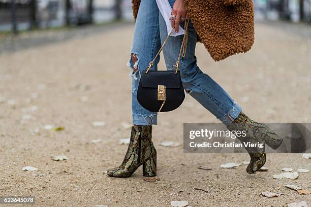 Person wearing white leather chelsea booties and black pants photo – Free  Boots Image on Unsplash