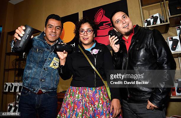 Recording artists Jose Carlos, Marisol Hernandez and Alex Bendana of La Santa Cecilia attend the gift lounge during the 17th annual Latin Grammy...