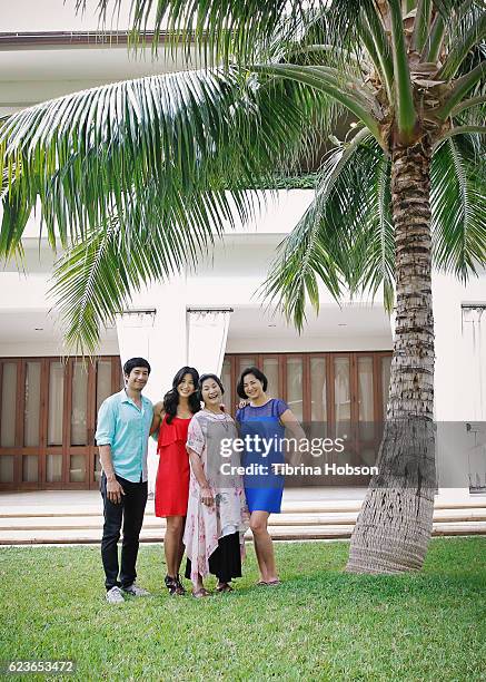 Cheng Pei-pei and her children pose for a portrait at the Hawaii International Film Festival 2016 at Halekulani Hotel on November 11, 2016 in...