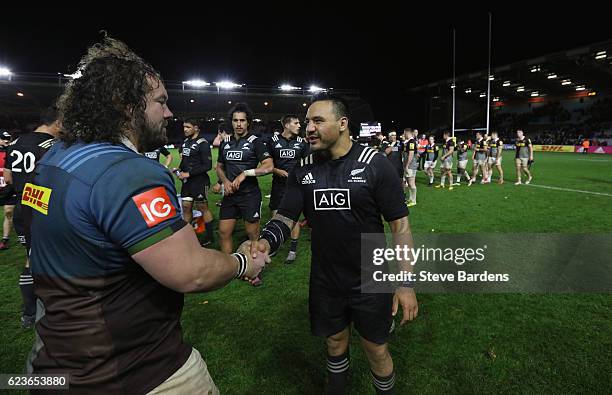 Adam Jones of Harlequins shakes hands with Ash Dixon of Maori All Blacks after the match between Harlequins and Maori All Blacks at Twickenham Stoop...