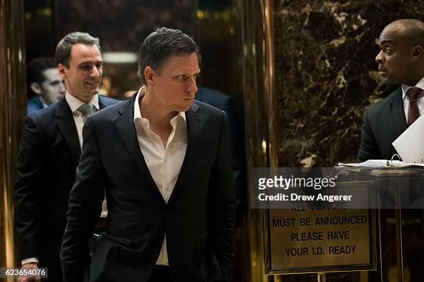 Peter Thiel, co-founder of PayPal and venture capitalist, leaves an elevator at Trump Tower, November 16, 2016 in New York City. President-elect...