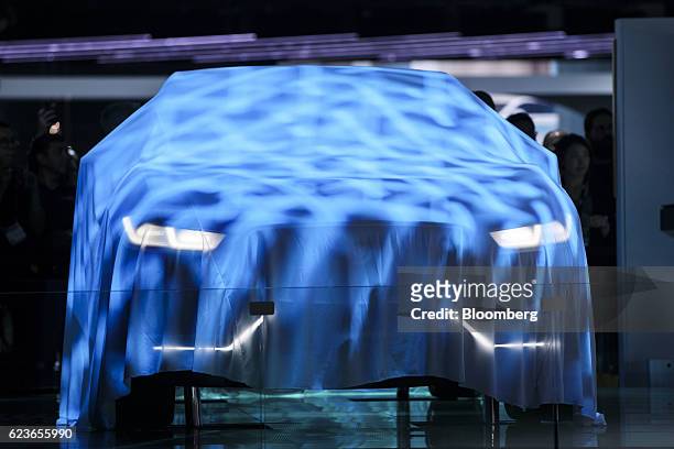 The Jaguar Land Rover Automotive Plc I-Pace Electric Concept luxury sport utility vehicle sits covered during Automobility LA ahead of the Los...