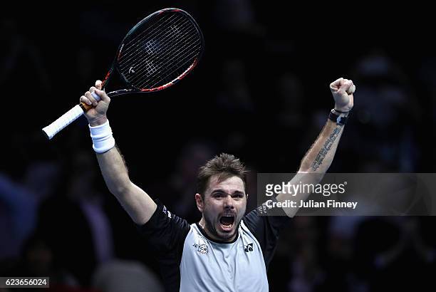 Stan Wawrinka of Switzerland celebrates match point during his men's singles match against Marin Cilic of Croatia on day four of the ATP World Tour...