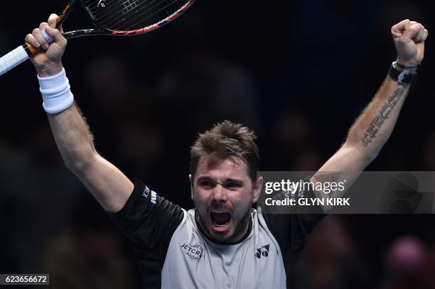 Switzerland's Stan Wawrinka reacts after winning against Croatia's Marin Cilic during their round robin stage men's singles match on day four of the...