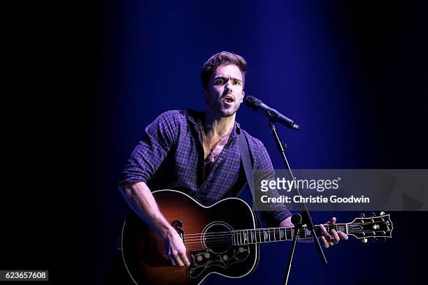 Andy Brown of Lawson performs on stage as part of the Rays of Sunshine charity concert at Wembley Arena on 24 October 2016 in London, United Kingdom.