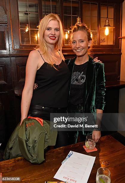 Lara Stone and Martha Ward attend Frame Pub Quiz on November 16, 2016 in London, England.