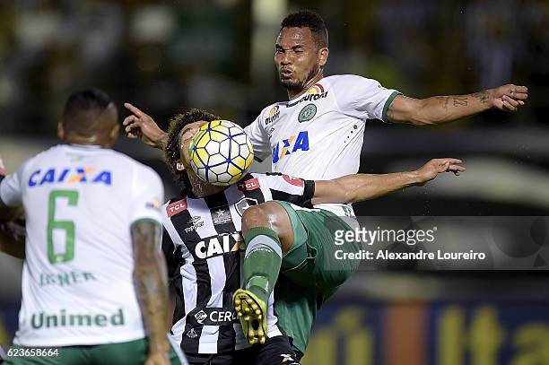 Camilo of Botafogo battles for the ball with Willian Thiego of Chapecoense during the match between Botafogo and Chapecoense as part of Brasileirao...