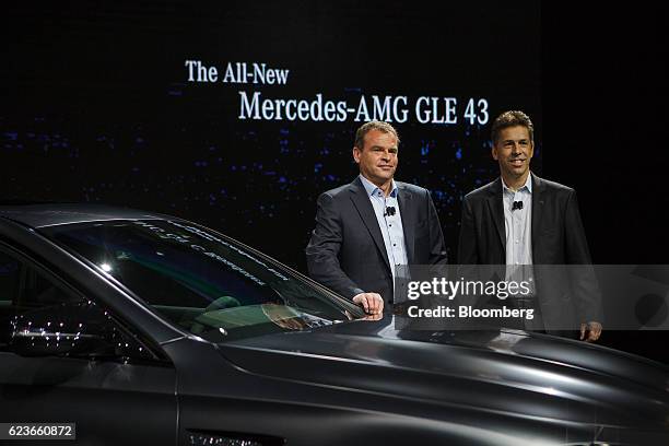 Tobias Moers, chief executive officer of Mercedes-Benz AMG, left, and Dietmar Exler, president and chief executive officer of Mercedes-Benz USA LLC,...