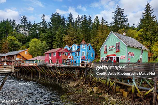 view of historic wooden architectures above ketchikan creek, creek street, ketchikan, alaska - alaska stock pictures, royalty-free photos & images