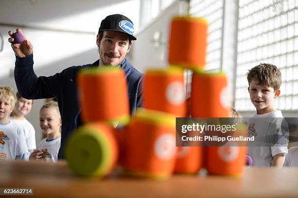 Ski athlete Felix Neureuther plays with schoolchildren during the kick off for a health initiative for children on November 15, 2016 in Penzberg,...