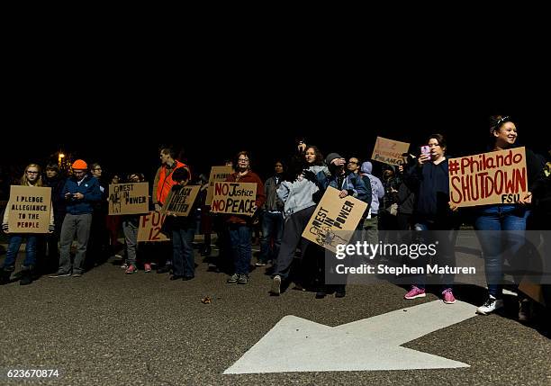 People gather at JJ Hill Montessori school, where Philando Castile worked, on November 16, 2016 in St. Paul, Minnesota. Ramsey County Attorney John...