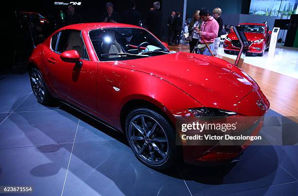 The Mazda MX-5 is seen on the Mazda showroom floor at the L.A. Auto Show on November 16, 2016 in Los Angeles, California.